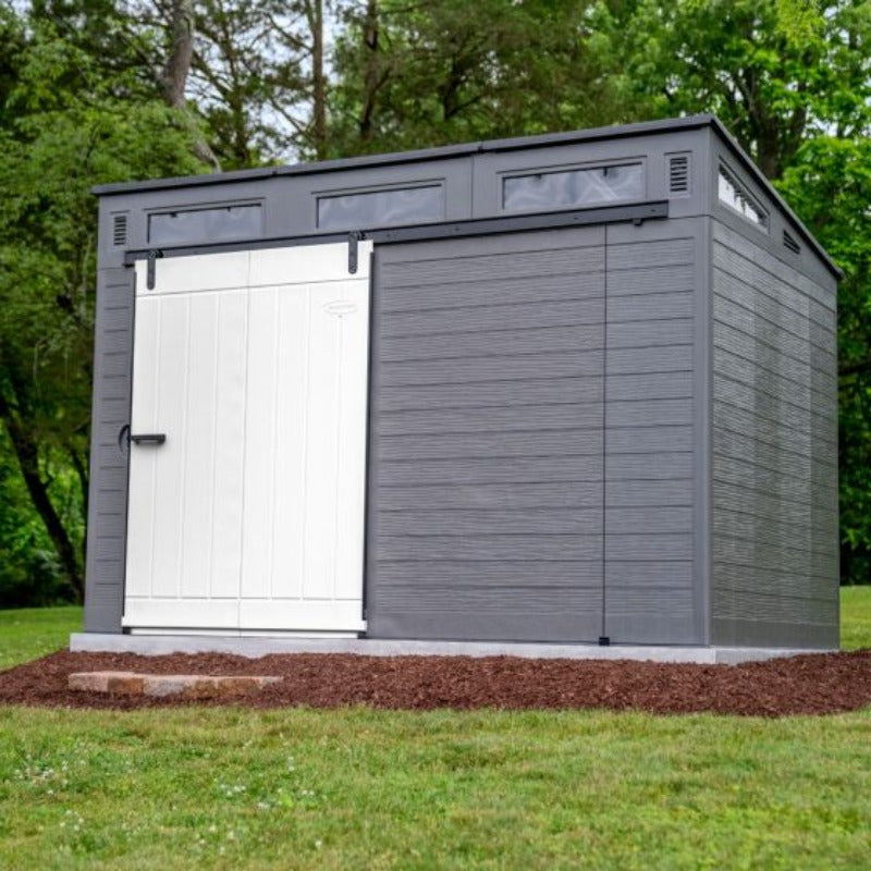 Backyard Lifestyles Modernist Barn Door 10'x7' Storage Shed - Peppercorn front view door closed outdoors