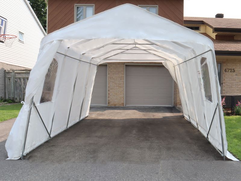 Gazebo Penguin Carport in White and Clear front view of white model with both vehicle doors open