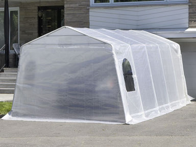 Gazebo Penguin Carport in White and Clear front angle view of clear shelter with car door closed