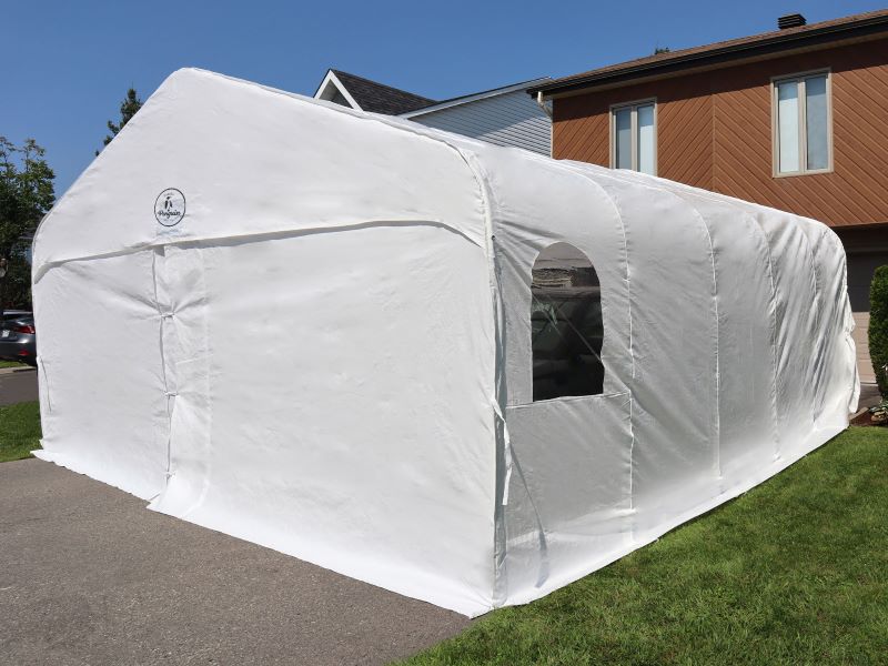 Gazebo Penguin Deluxe Double Car Shelter Front Angle View of Portable Car Shelter With Closed Doors