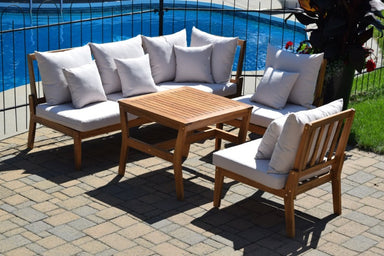 Corriveau Outdoor Furniture Napoli Sectional Set 5-pcs front view of patio furniture re-arranged on a patio in front of a pool