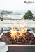 Backyard Lifestyles Modeno -  Aurora Fire Table Square Black close up view of flames and stones in fire pit