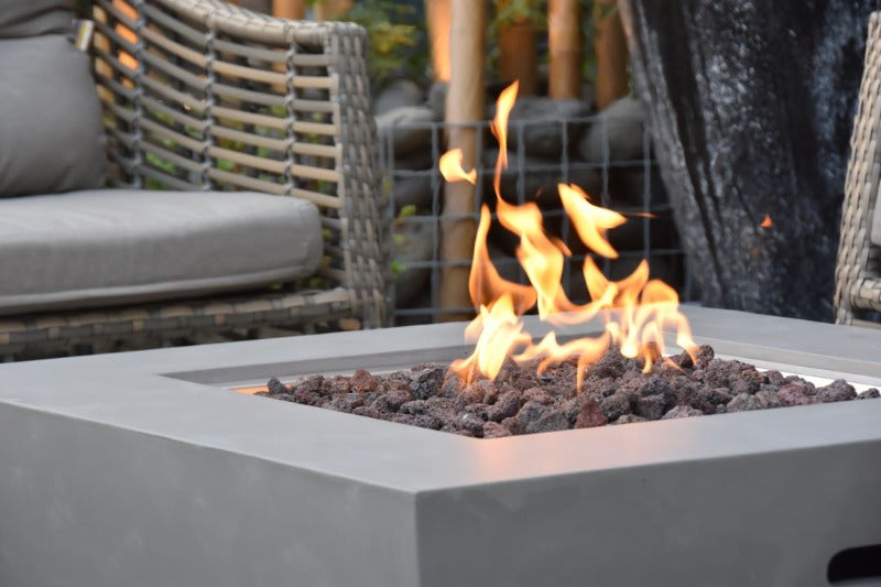 Backyard Lifestyles Modeno - Florence Fire Table - Natural Concrete front close up view of fire table with open flame