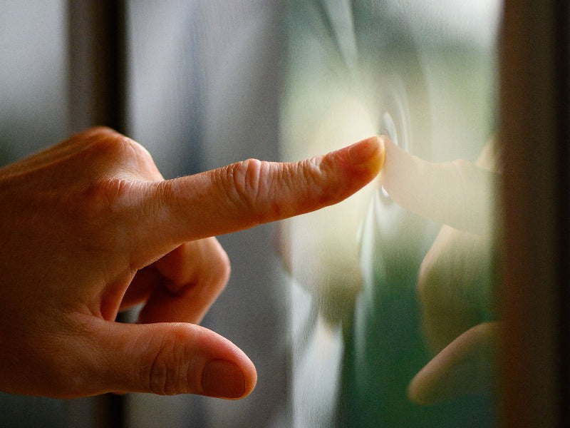 Gazebo Penguin Florence Wall Mounted Solarium Polycarbonate Roof close up of a hand pushing on windows showing durability